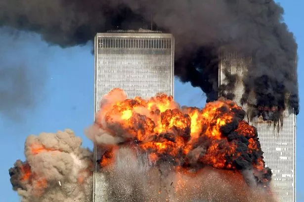 Hijacked United Airlines Flight 175 from Boston crashes into the south tower of the World Trade Center and explodes at 9:03 a.m. on September 11, 2001 in New York City.