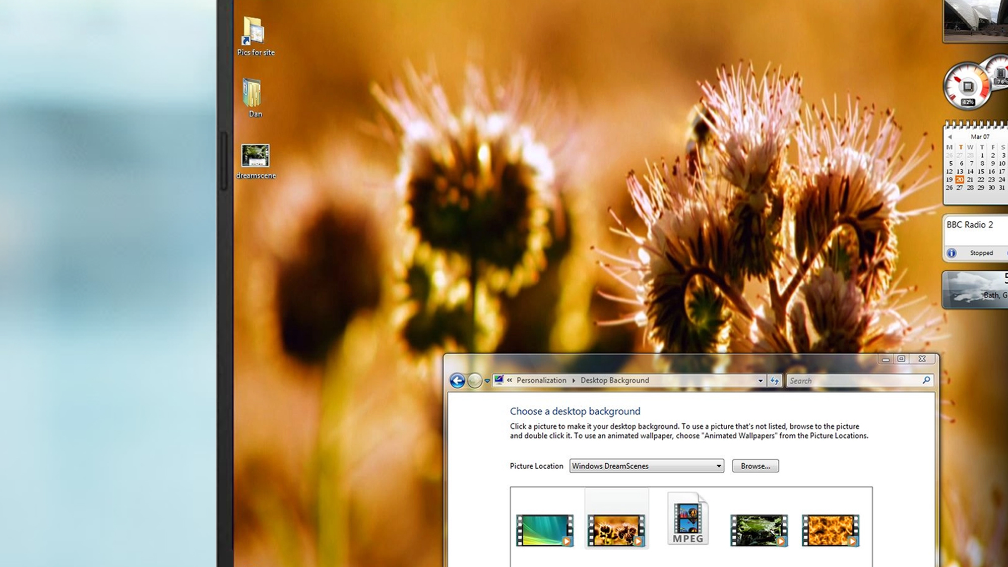 A laptop screen showing Windows Vista's wallpaper options