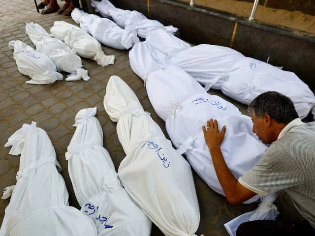a mourner reacts during the funeral of palestinians from irheem family who were killed in an overnight israeli strike according to medics in gaza city august 11 2025 reuters