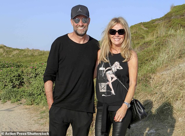Jurgen Klopp says he does not miss management and has absolutely no plans to return (pictured with his wife Ulla)