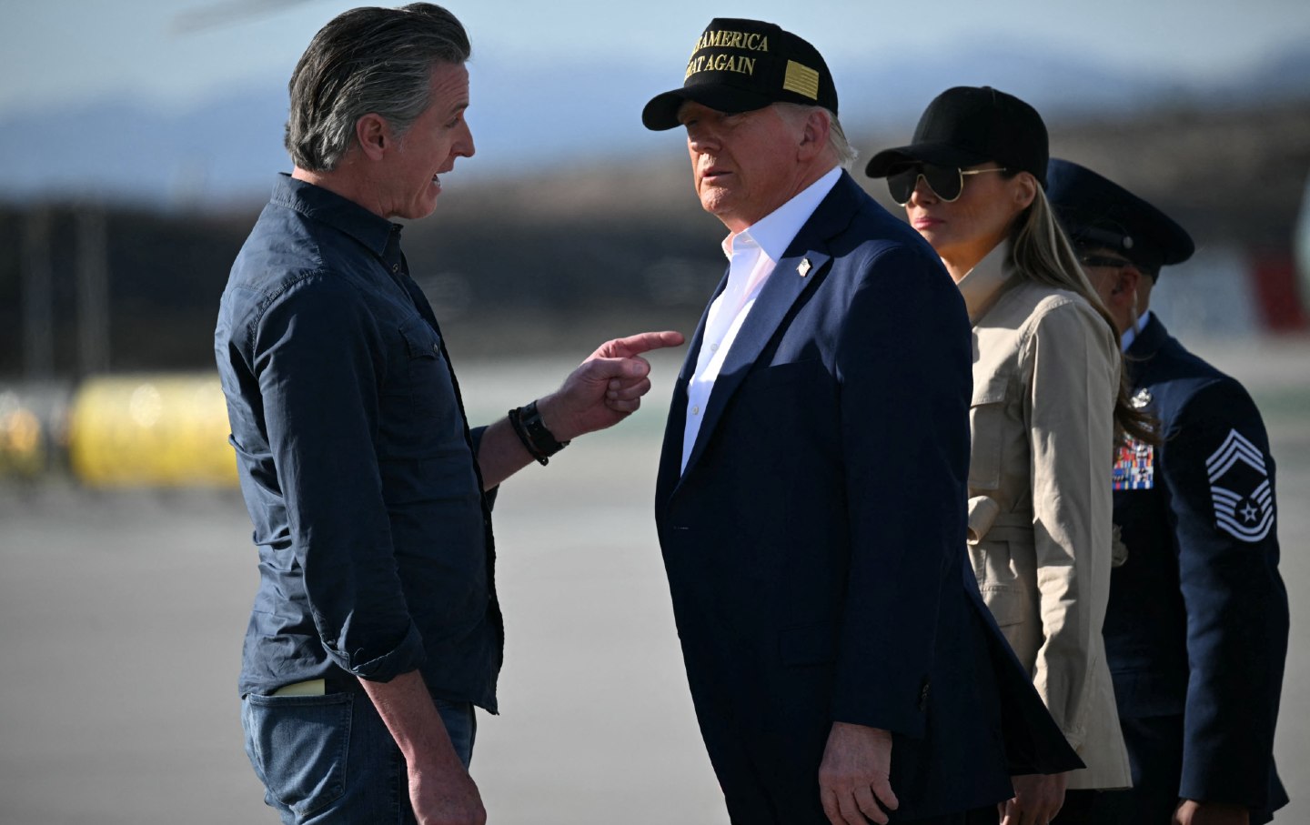 California Governor Gavin Newsom greets Donald Trump at Los Angeles International Airport in Los Angeles, California