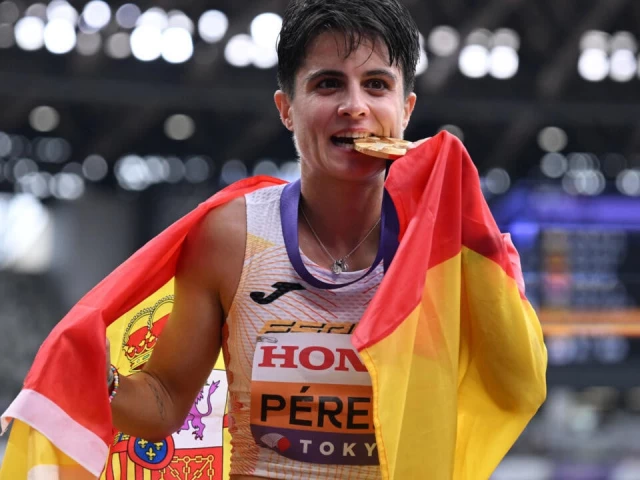 spain s maria perez celebrates after winning the women s 20km race walk photo afp
