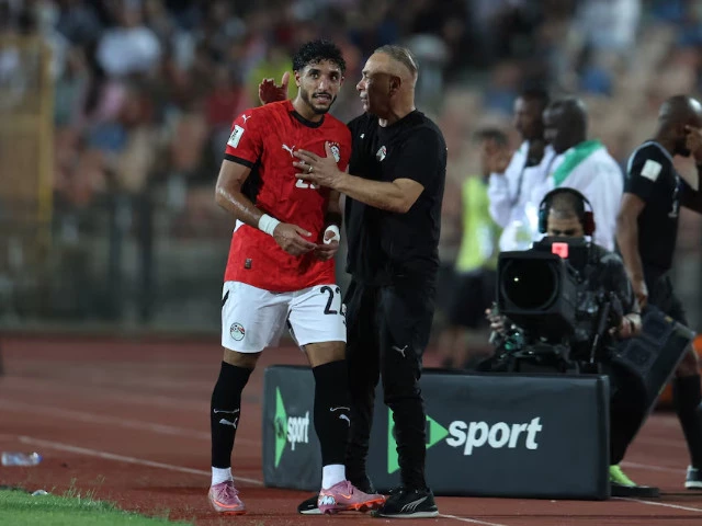 egypt s omar marmoush with egypt coach hossam hassan after being substituted photo reuters