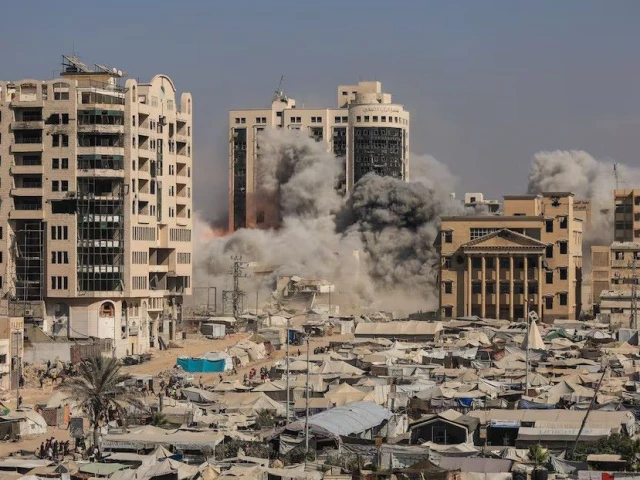 smoke and flames rise as a residential building collapses after an israeli air strike in gaza city september 8 2025 photo reuters