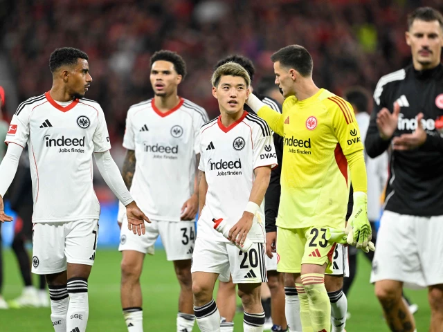 bayer 04 leverkusen s players celebrate after the end of the german first division bundesliga match photo afp