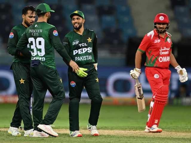 pakistan s team player celebrates the dismissal of oman s zikria islam r during the asia cup 2025 twenty20 international cricket match between oman and pakistan at the dubai international stadium in dubai on september 12 2025 photo afp