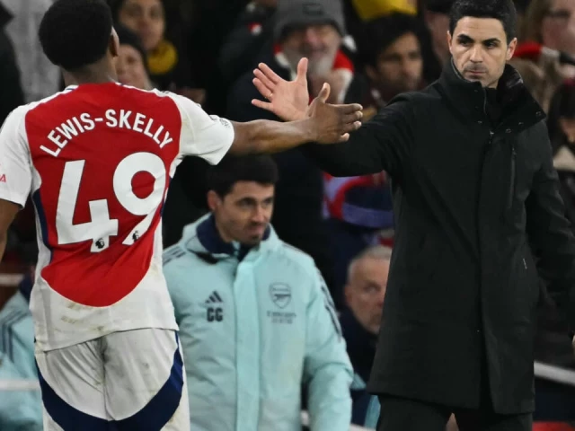 arsenal boss mikel arteta r and defender myles lewis skelly photo afp