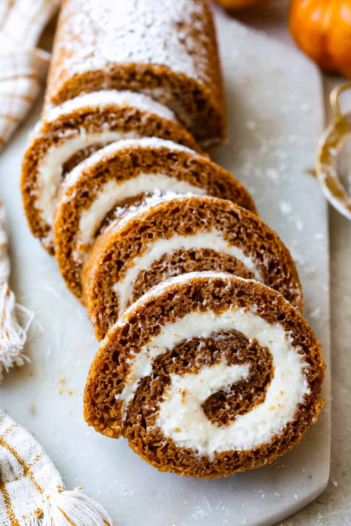 Sliced up pumpkin roll cake.