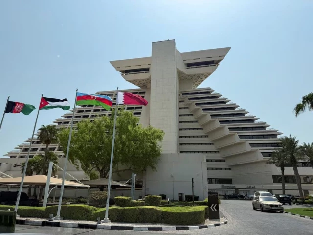 flags of afghanistan jordan azerbaijan and qatar flutter as qatar prepares to host the emergency arab islamic summit at the sheraton hotel in doha qatar september 14 2025 reuters