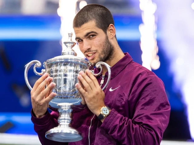 carlos alcaraz of spain with the us open trophy after winning the final of men s singles at billie jean king national tennis center on sept 8 2025 photo reuters