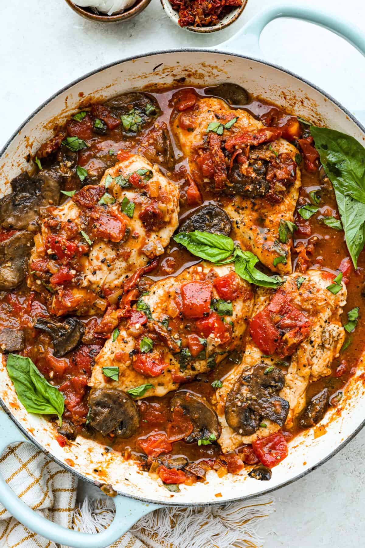 Tuscan garlic skillet chicken all cooked up in a skillet.