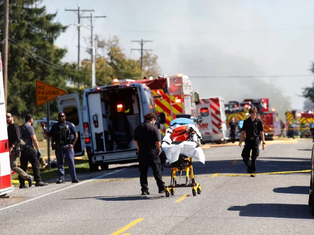 emergency personnel work at the scene of a shooting which took place at the church of jesus christ of latter day saints according to police in grand blanc michigan u s september 28 2025 photo reuters
