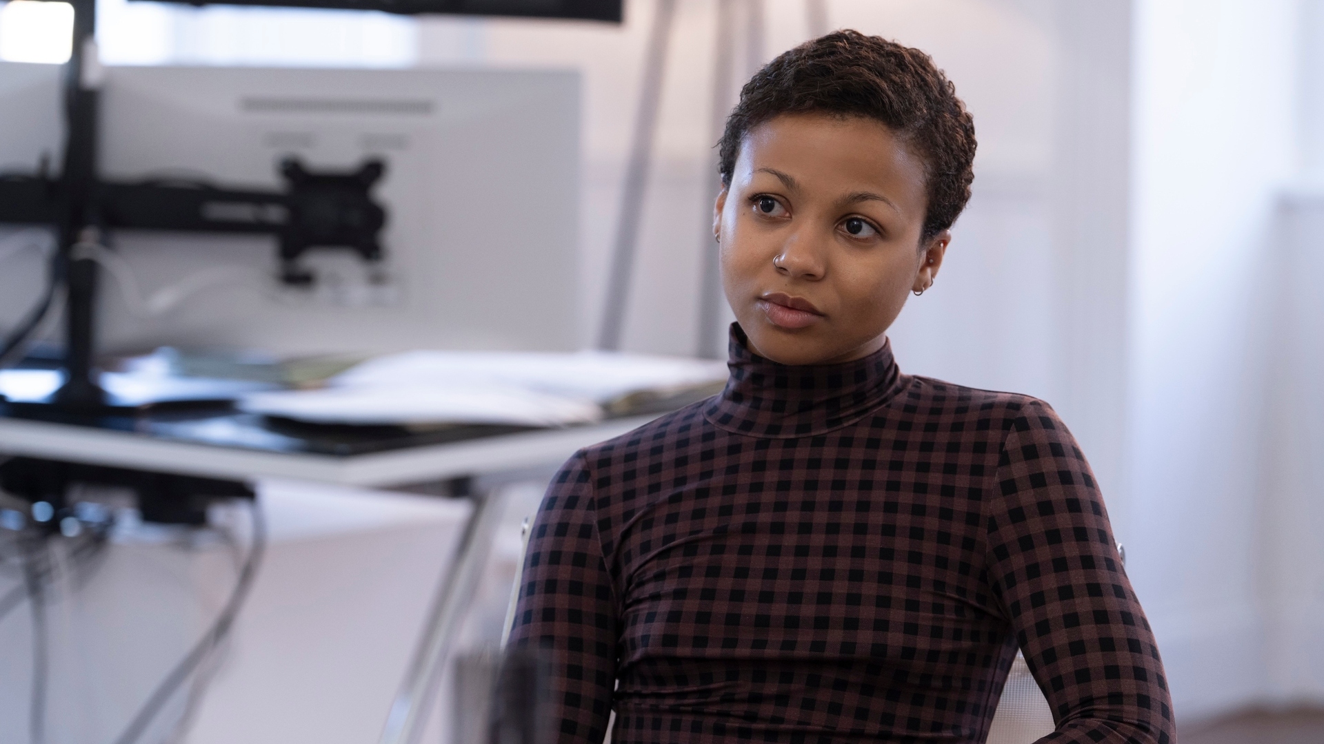 Harper looks to the side in Industry season 3