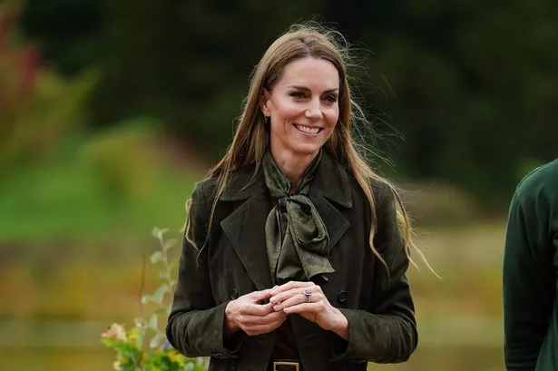 WINDSOR, ENGLAND - SEPTEMBER 18: Catherine, Princess of Wales presents "Go Wild" badges as she meets members of the Scouts