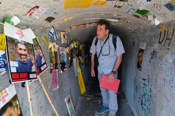 Mirror defence editor Chris Hughes inside the replica Hamas tunnel in Hostage Square, Tel Aviv