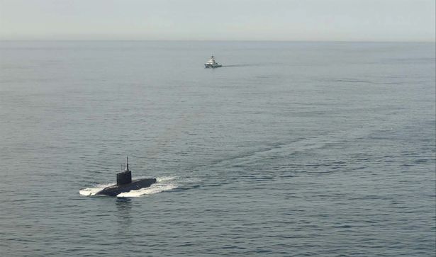 The submarine being closely monitored by NATO forces