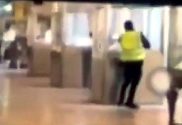 A man seen cutting through glass to access the jewels in the Louvre