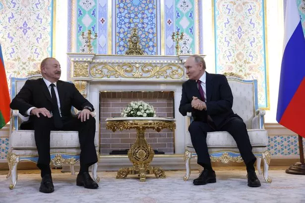 Vladimir Putin and Azerbaijan President Ilham Aliyev