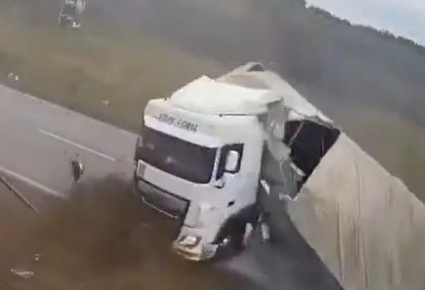 Debris and mud flew across the road after the crash