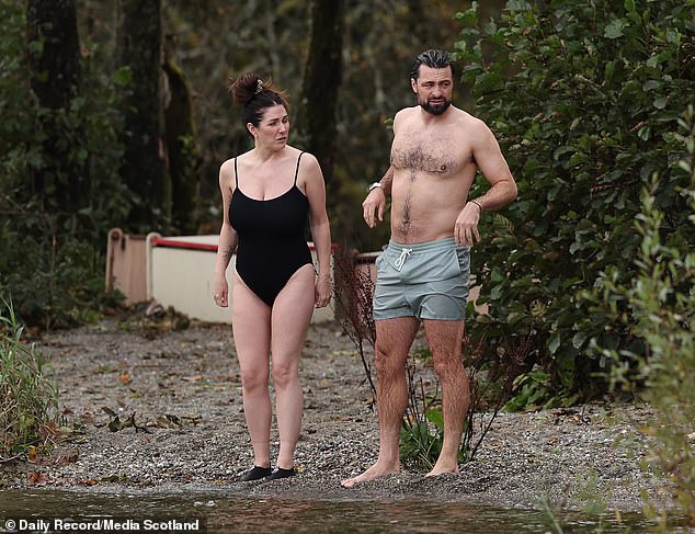 Russell Martin, pictured with model girlfriend Lucy Pinder, enjoyed a romantic dip in Loch Lochond following his sacking at Rangers