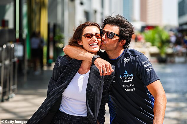 Carlos Sainz, pictured with girlfriend Rebecca Donaldson, complained last week that the F1 cameras were spending too much time on the WAGs, rather than the action on track