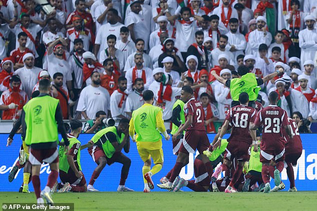 Chaos broke out in Doha on Tuesday night as Qatar secured their place in next summer