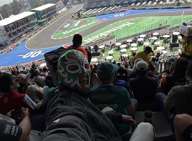 A masked F1 star sneaked into the stands to watch first practice at the Mexican Grand Prix