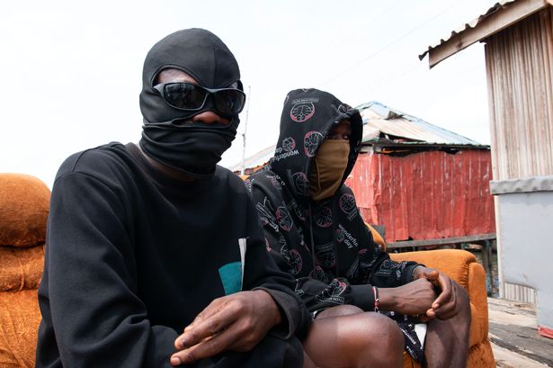 Two young Nigerian internet scammers, known locally as ‘Yahoo Boys’.