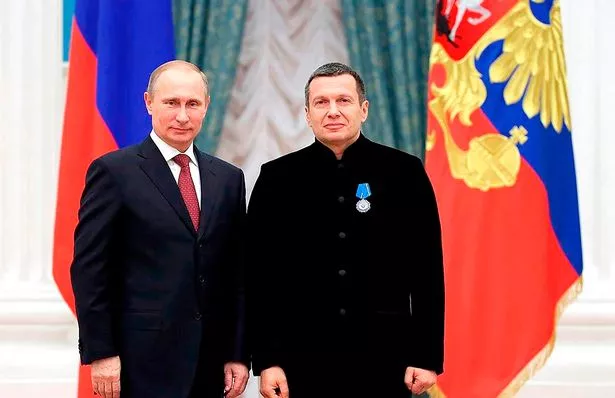 Kremlin stooge Vladimir Solovyov with Putin