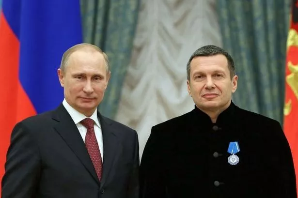 Kremlin stooge Vladimir Solovyov with Putin