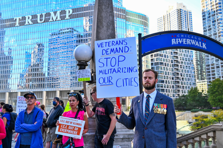 Protesters rally in Chicago against ICE, military presence.