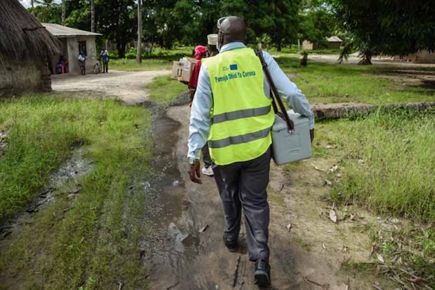 A Community Health Worker in a door-to-door campaign to vaccinate people in communities in Nanyamba village, Mtwara Region, in southeastern Tanzania. Credit: Kizito Makoye/IPSA Community Health Worker in a door-to-door campaign to vaccinate people in communities in Nanyamba village, Mtwara Region, in southeastern Tanzania. Credit: Kizito Makoye/IPS