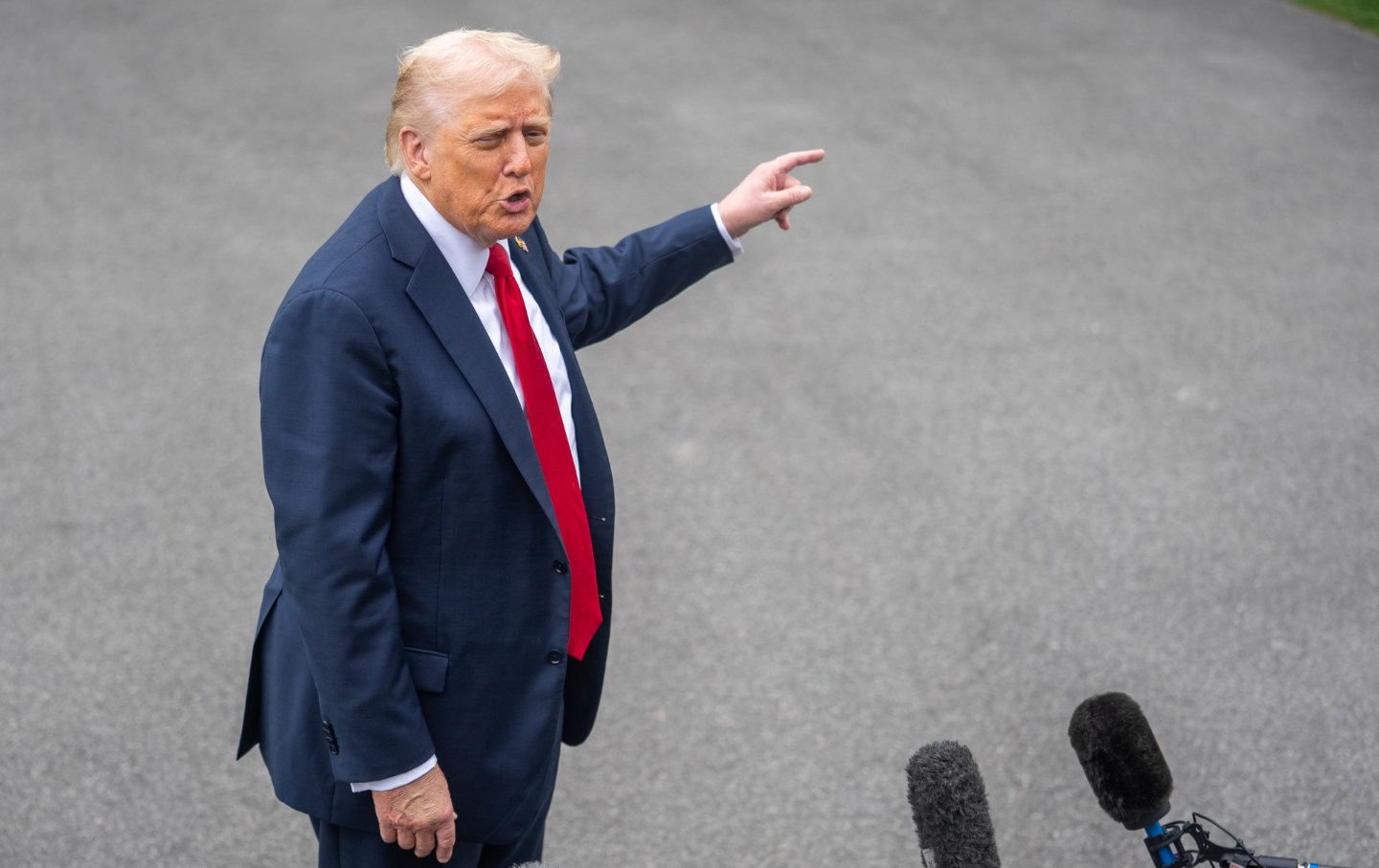 Donald Trump speaks to reporters at the White House in Washington, D.C., the United States, Sept. 30, 2025