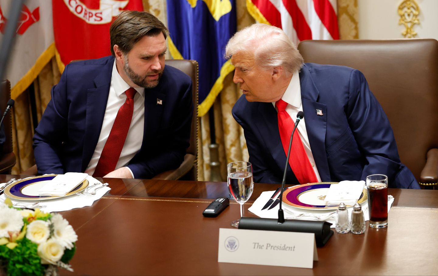 Donald Trump speaks with U.S. Vice President JD Vance (L) during a meeting with President of Argentina Javier Milei in the Cabinet Room at the White House on October 14, 2025