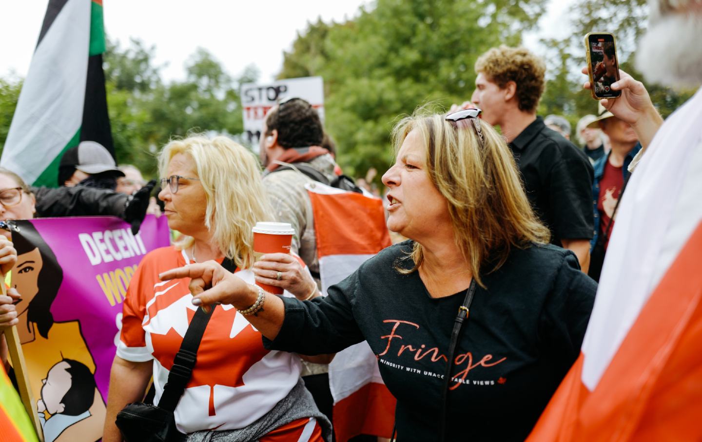 Right wing protestors yelling.