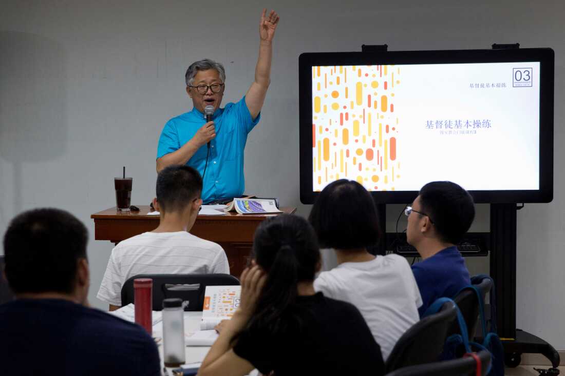 Pastor Ezra Jin leads a class on the basics of Christian beliefs at the Zion Church in Beijing, China, in August 2018.