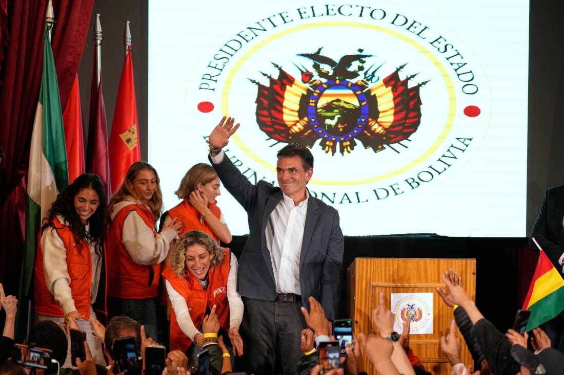 Presidential candidate Rodrigo Paz waves to supporters after preliminary results showed him leading in the presidential runoff election in La Paz, Bolivia on Sunday.