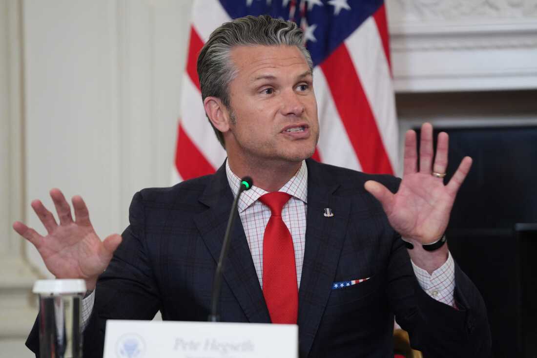 Defense Secretary Pete Hegseth speaks during a roundtable on criminal cartels with President Trump in the State Dining Room of the White House on Thursday.