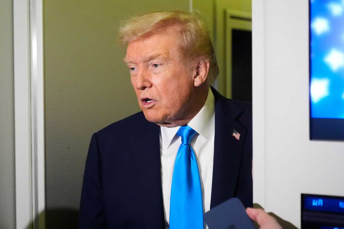 President Trump speaks with reporters aboard Air Force One at Al Udeid Air Base in Doha, Qatar, on Saturday, Oct. 25, 2025.