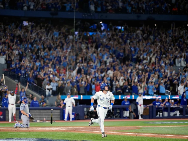 toronto blue jays addison barger hits a grand slam home run against the los angeles dodgers during the sixth inning in game one of the 2025 world series at rogers center on october 24 2025 in toronto ontario photo afp