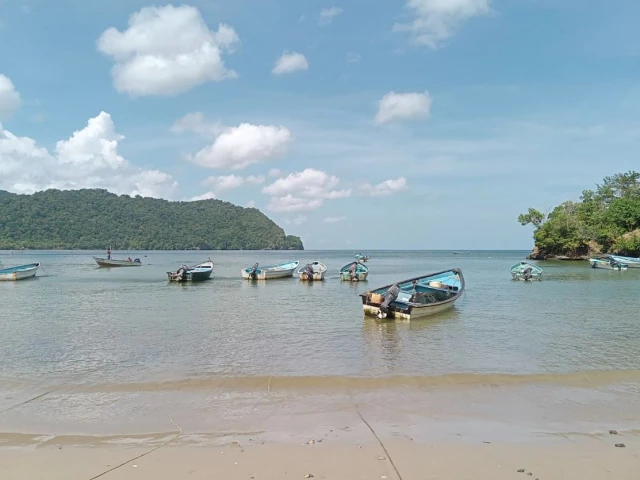 boats are pictured on the shore of la cueva bay north coast of trinidad and tobago on october 16 2025 us president donald trump said he had authorized covert action against the south american nation amid a military campaign targeting what washington says are drug traffickers in the caribbean and pacific photo afp