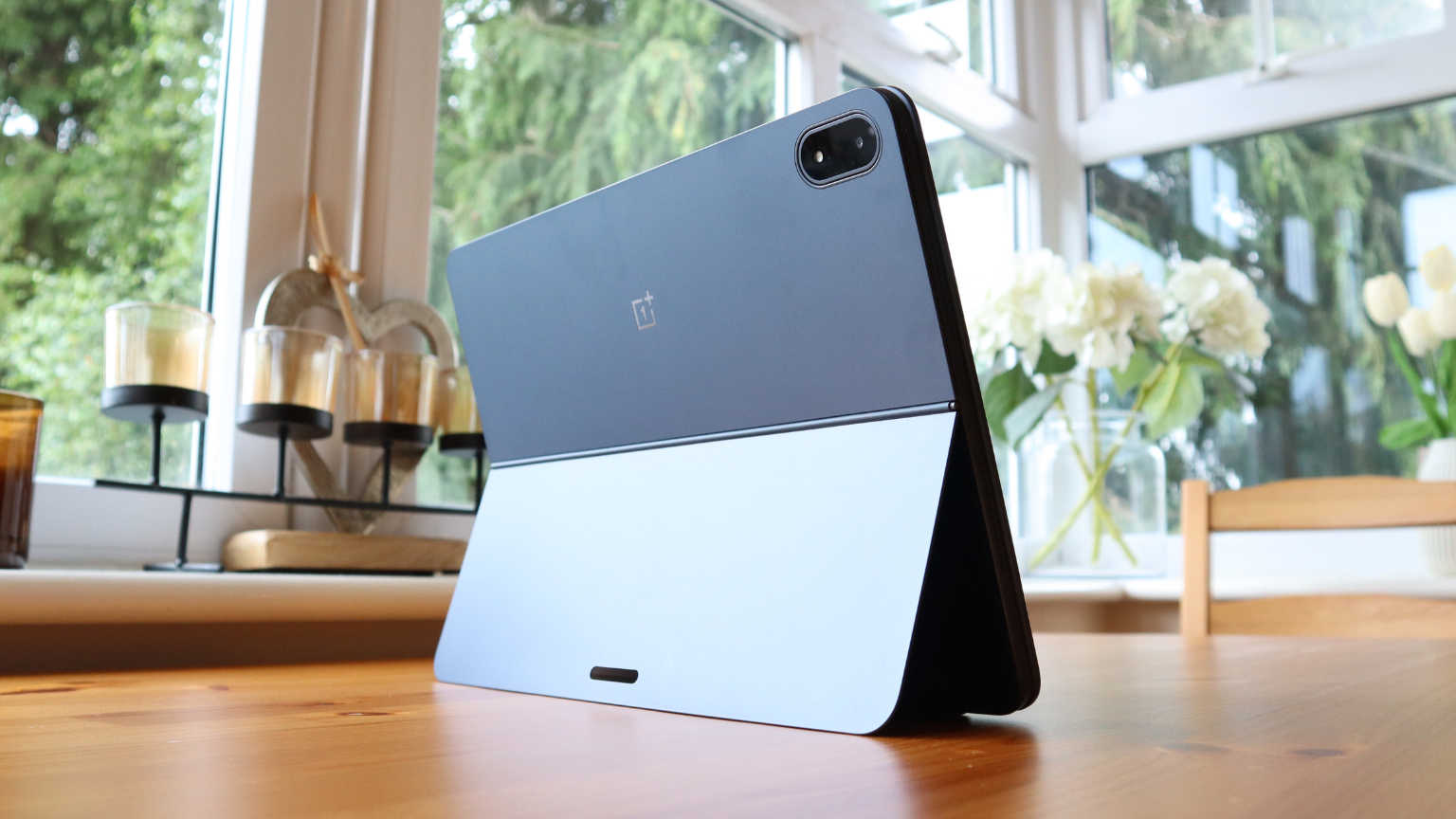 OnePlus Pad 3 in a case on a wooden table