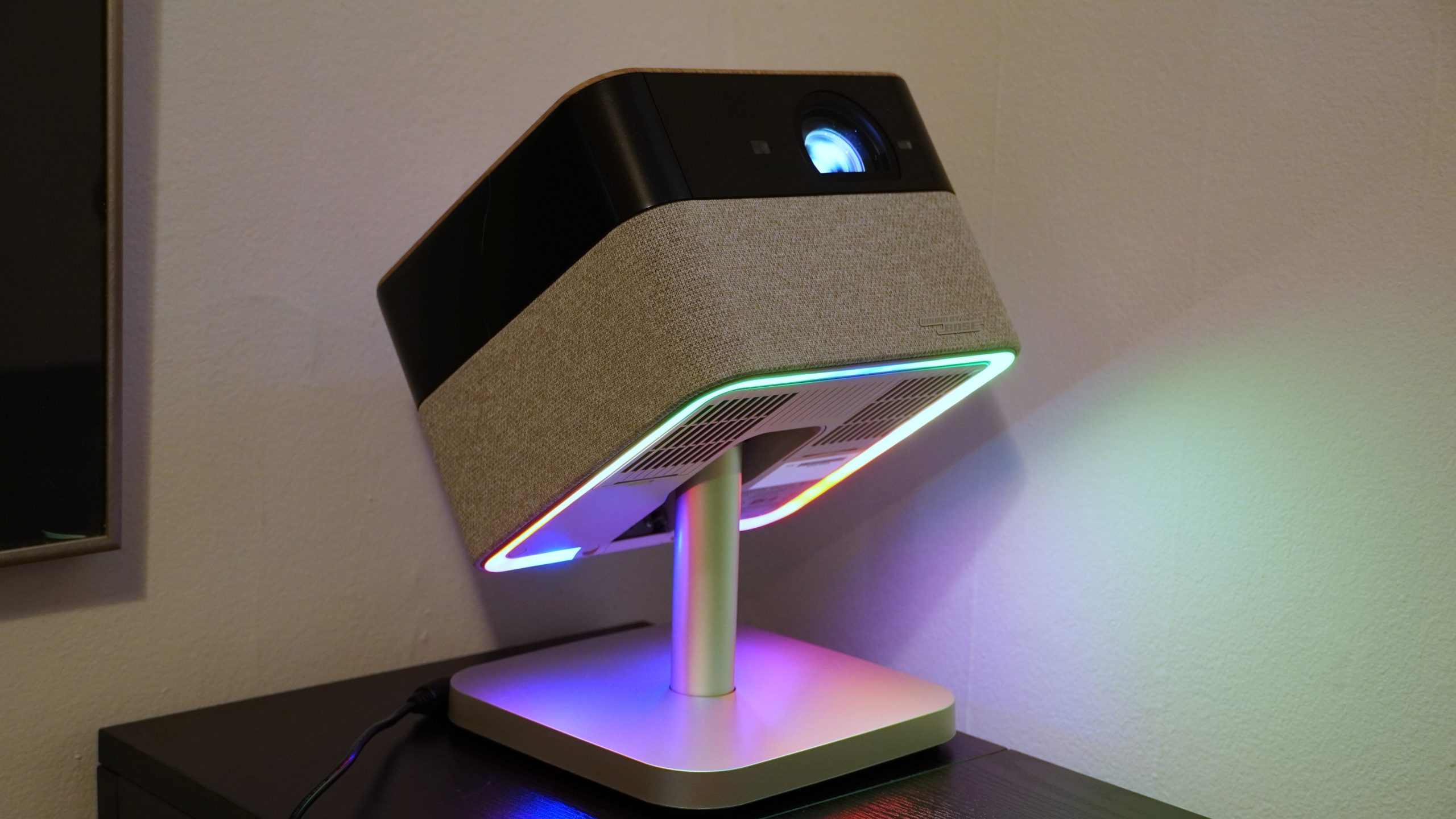 Epson Lifestudio Flex Plus tilted up on table showing colored lights