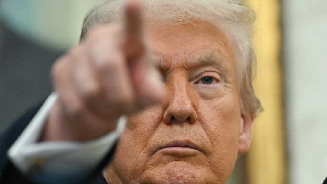 President Trump speaks during a press conference in the Oval Office of the White House in Washington, D.C., on Oct. 15.