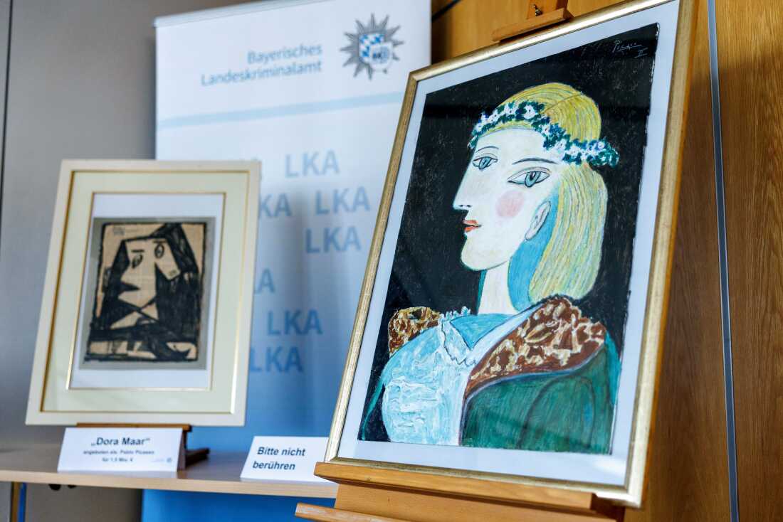 Two forged artworks purportedly by the Spanish artist Pablo Picasso are seen during a presentation at the Bavarian State Criminal Investigation Department in Munich on Friday.