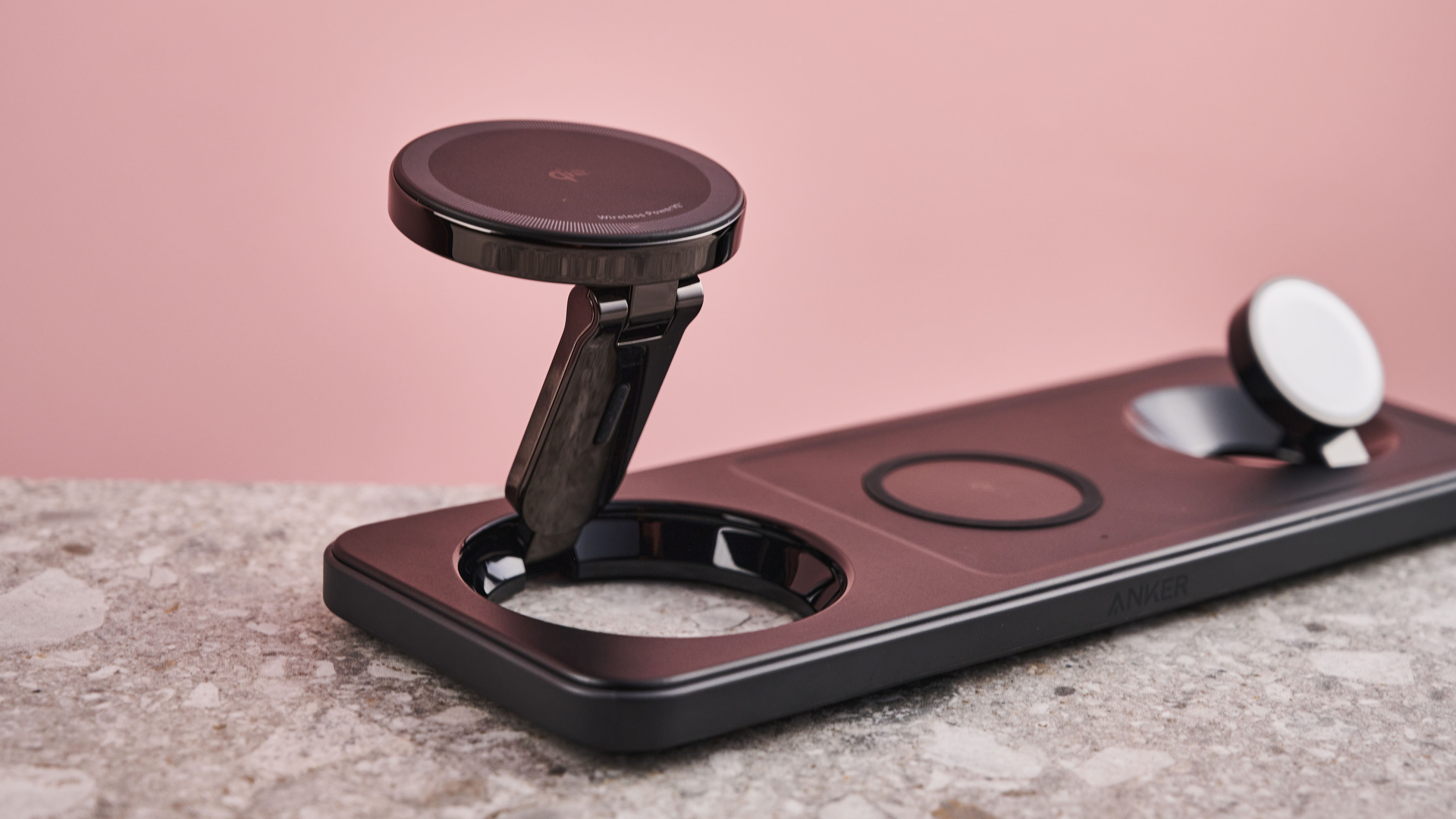 The iPhone charging pad is fully extended.