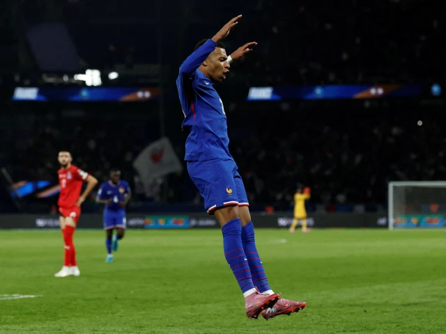 france s kylian mbappe celebrates scoring their first goal against azerbaijan during their fifa world cup uefa qualifiers group d match photo reuters