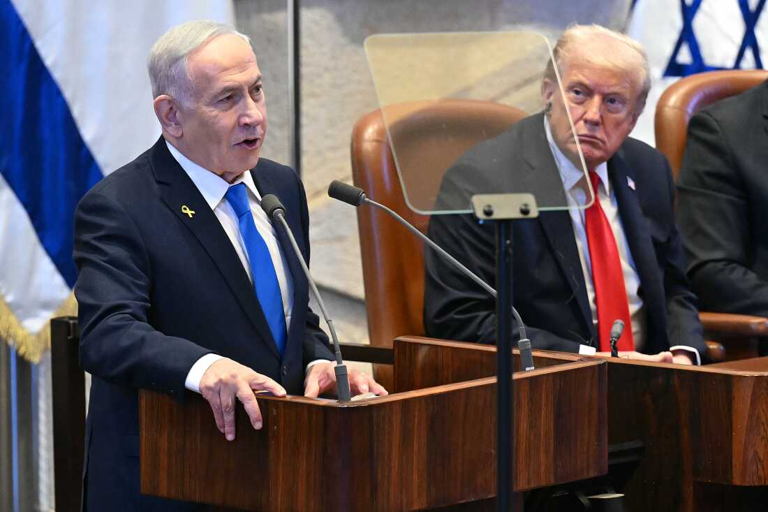 Israeli Prime Minister Benjamin Netanyahu addresses the Israeli parliament, the Knesset, on Oct. 13, in Jerusalem as President Trump listens. Israel has scored decisive battlefield victories throughout the region in the past two years, but is increasingly isolated on the world stage.