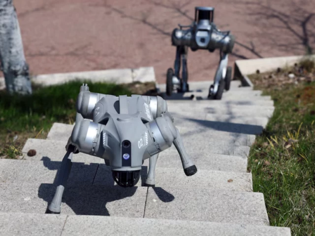 unitree robot dogs climb a flight of stairs during a demonstration to reuters at a park in hangzhou zhejiang province china source reuters