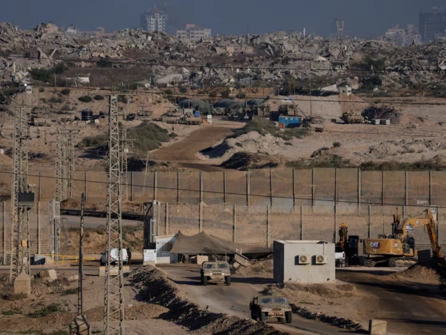 israeli military vehicles manoeuvre near the israel gaza border as seen from israel september 19 2025 photo reuters